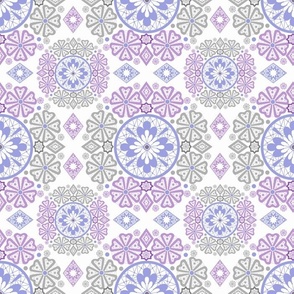 Openwork ornament in gray, blue and lilac colors