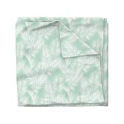 palm leaves - white on mint, small. silhuettes tropical forest mint light green mint hot summer palm plant tree leaves fabric wallpaper giftwrap