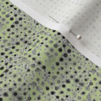 Dots and Spots of Grey Smudged on Cool Spring Green