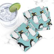 Rockhopper Penguins on Light Blue