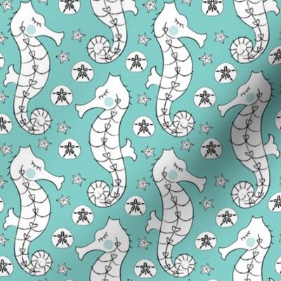 white seahorses on teal