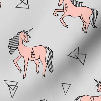 unicorn fabric // cute pink and grey unicorns baby nursery design by andrea lauren