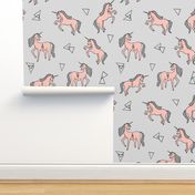 unicorn fabric // cute pink and grey unicorns baby nursery design by andrea lauren