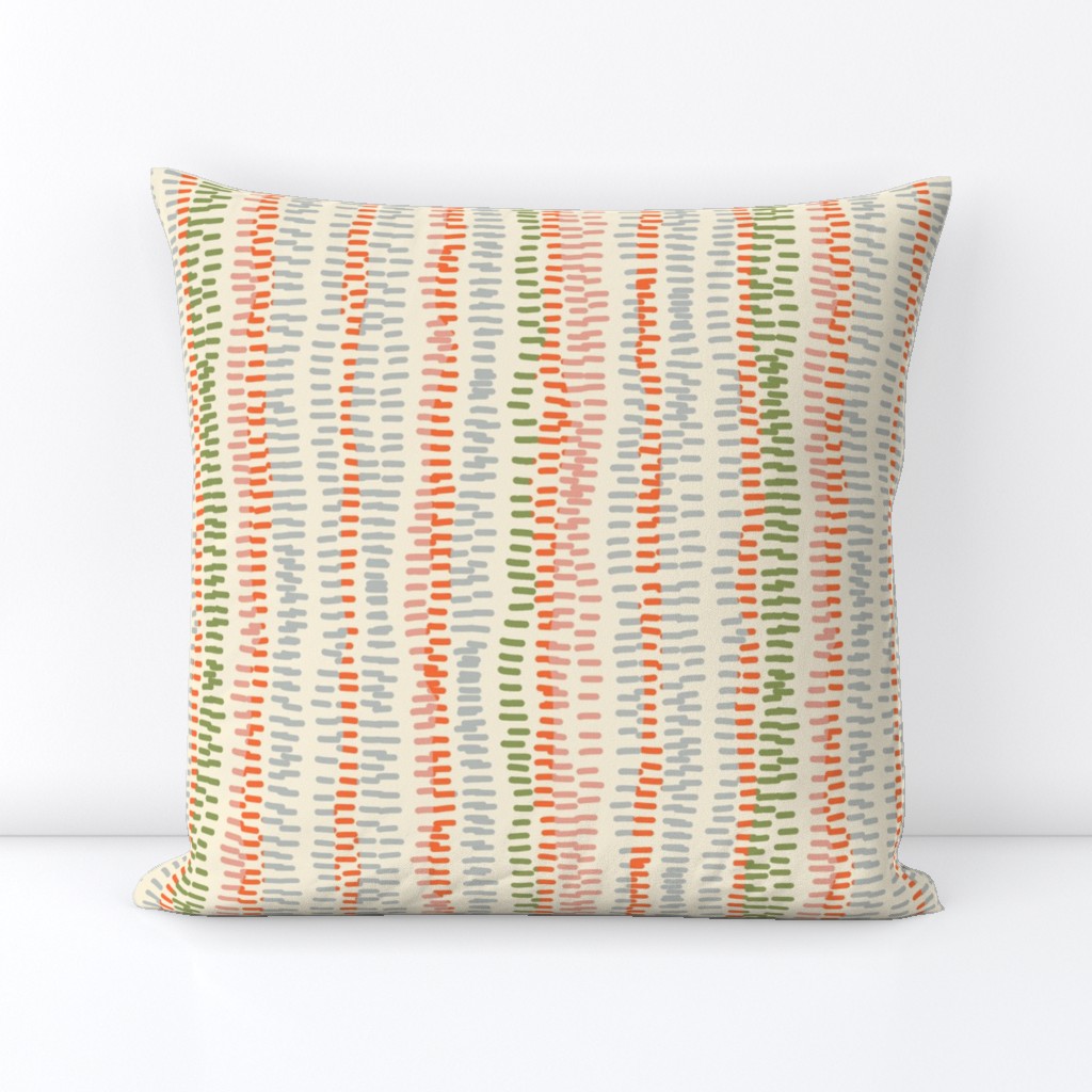 stitched rows in gray, green and orange on beige