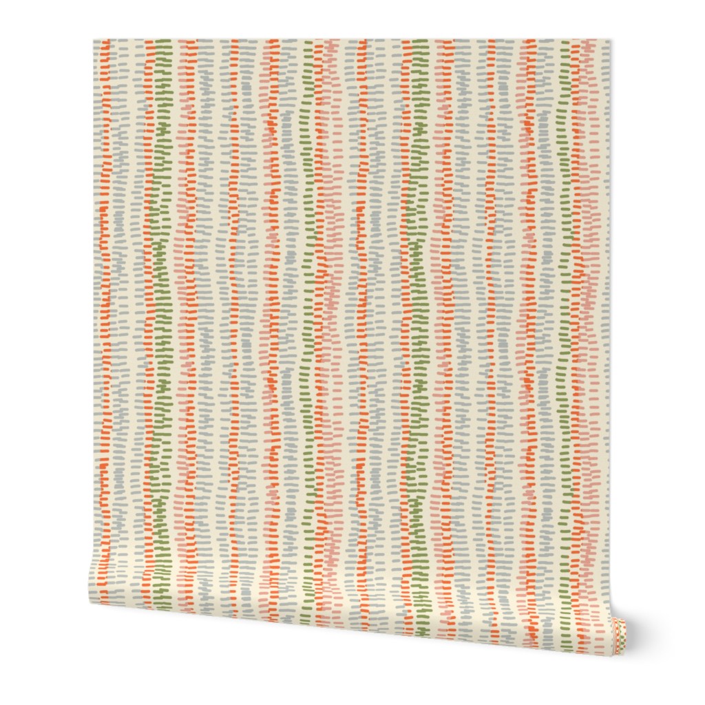 stitched rows in gray, green and orange on beige