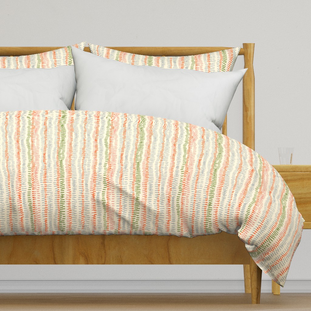 stitched rows in gray, green and orange on beige