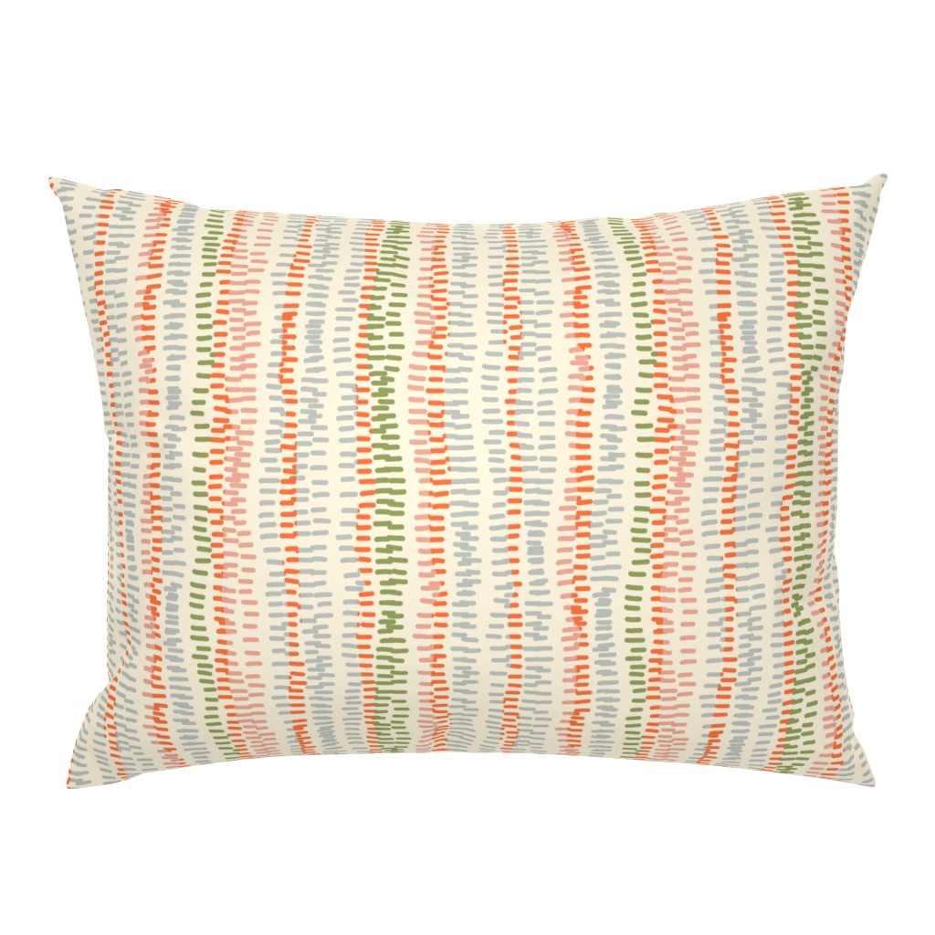 stitched rows in gray, green and orange on beige