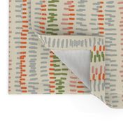 stitched rows in gray, green and orange on beige