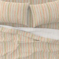 stitched rows in gray, green and orange on beige