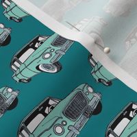 green Studebaker Lark on teal (diagonal rows)