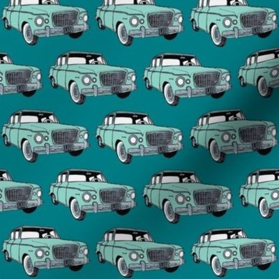 green Studebaker Lark on teal (diagonal rows)