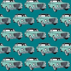 green Studebaker Lark on teal (diagonal rows)