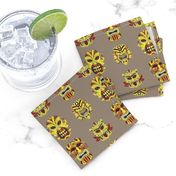 TIKI small YELLOW ON BEIGE HAWAII POLYNESIAN