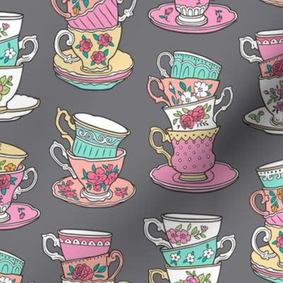 Stacked Tea cups with Vintage Roses Flowers on Dark Grey