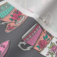 Stacked Tea cups with Vintage Roses Flowers on Dark Grey