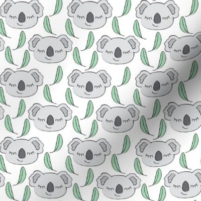 small koalas with green leaves