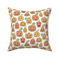 Halloween Jack-O-Lantern Scary Pumpkin Fabric  Orange on White 