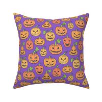 Halloween Jack-O-Lantern Scary Pumpkin Fabric  Orange on Purple