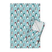 winter penguins // penguin in hats and scarves winter pingu holiday xmas fabric - lite blue