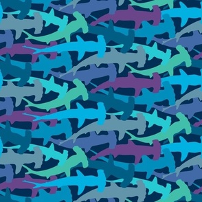 hammerhead sharks on blue