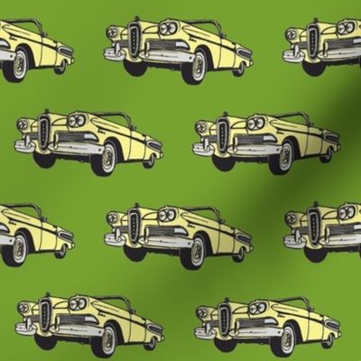 yellow 1958 Edsel Citation convertible on green background