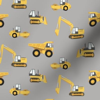construction trucks - yellow on grey