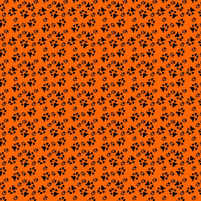 paw prints black on orange