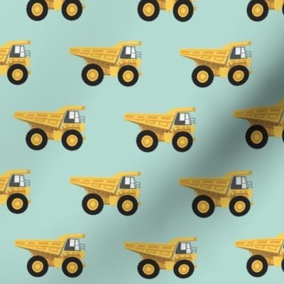 dump trucks - yellow on dark mint