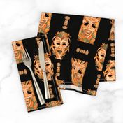 ORANGE OCHER TIKI MASKS ON BLACK