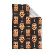 ORANGE OCHER TIKI MASKS ON BLACK