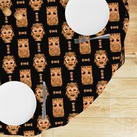 ORANGE OCHER TIKI MASKS ON BLACK