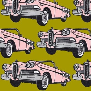 big pink 1958 Edsel Citation convertible on mustard background