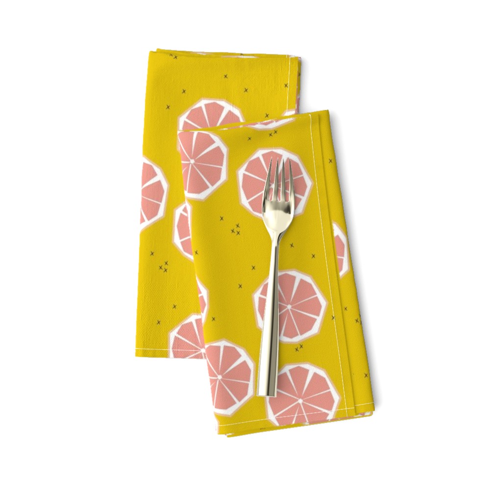 Pink grapefruit slices - tropical summer fruit citrus