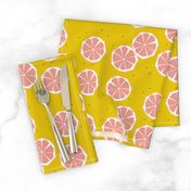 Pink grapefruit slices - tropical summer fruit citrus