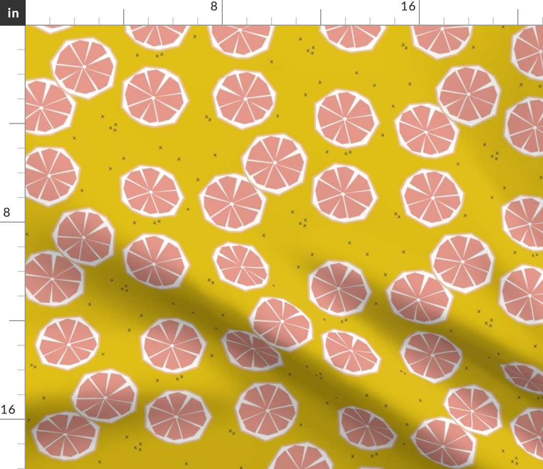 Pink grapefruit slices - tropical summer fruit citrus