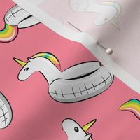 unicorn pool float toss on pink