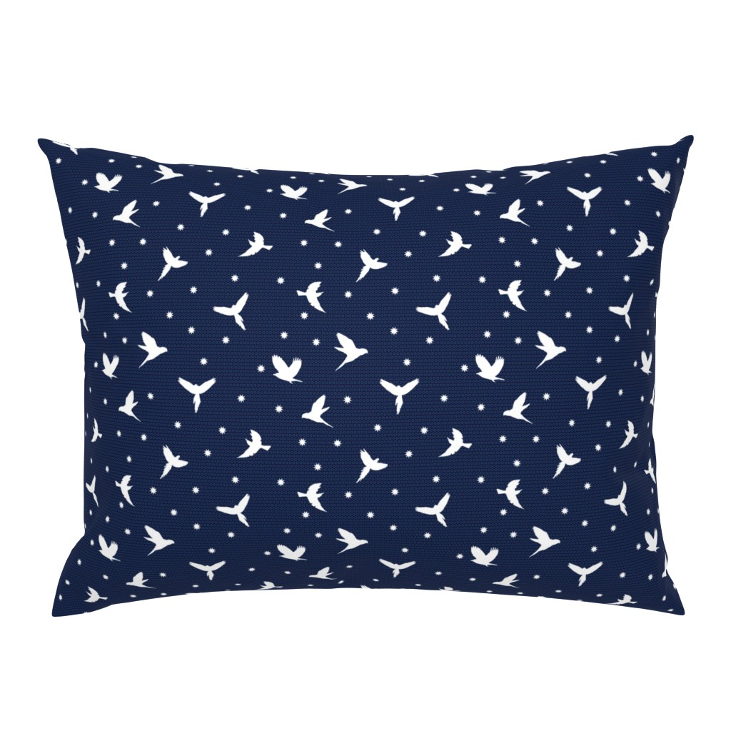 White flying birds on dark blue