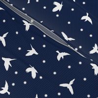 White flying birds on dark blue