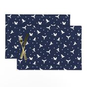 White flying birds on dark blue