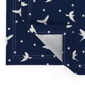 White flying birds on dark blue