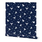 White flying birds on dark blue