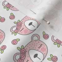 sleeping bear-with-pink rosebuds-on-white