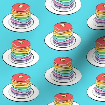 rainbow pancake stacks on blue