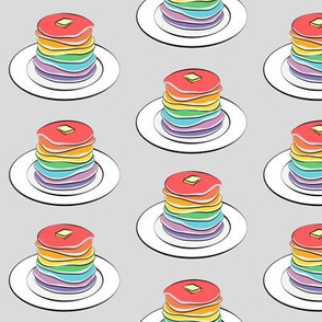 rainbow pancake stacks on grey