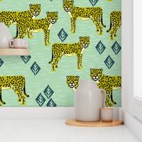 cheetah fabric // linocut african animal big cat design - mint