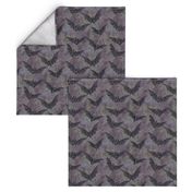 black bats on mottled purple