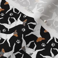 Tiny Trotting Toy Fox Terriers and paw prints - black
