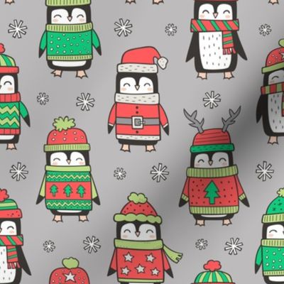 Christmas Holiday Winter Penguins in Ugly Sweaters Scarves & Hats On Grey