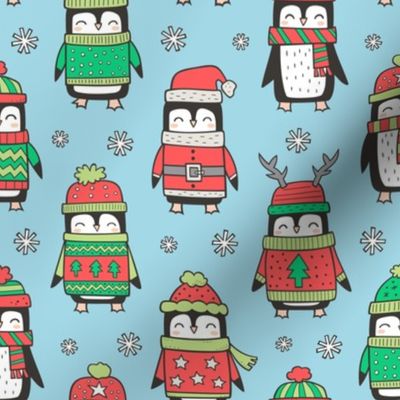 Christmas Holiday Winter Penguins in Ugly Sweaters Scarves & Hats On Blue