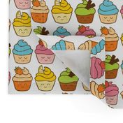 rainbow of happy cupcakes